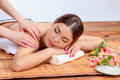 Person receiving a relaxing massage, representing the benefits and diverse applications of massage therapy